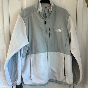 White and grey north face zip up